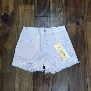 Pink jean shorts from Risen Jeans.